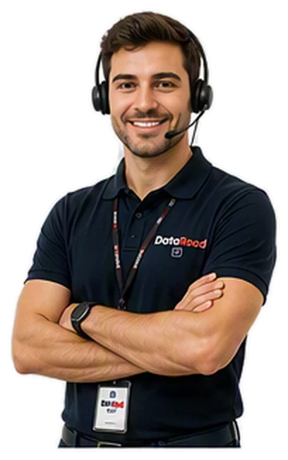 Support agent with headset and mic, arms crossed, smiling in a navy DataRoad polo with badge.